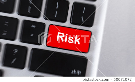 Risk word on red computer keyboard button 50071072