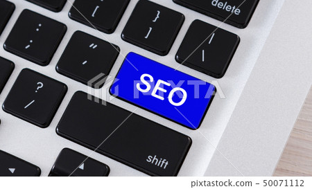 SEO text on blue button of computer keyboard SEO text on blue button of computer keyboard 50071112