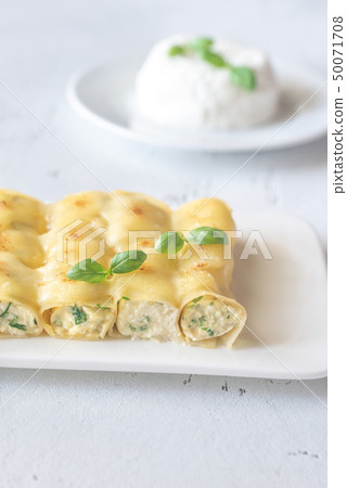 Cannelloni stuffed with ricotta Cannelloni stuffed with ricotta 50071708