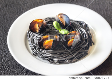 Black pasta with mussels 50071724