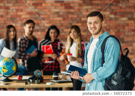 Group of highschool students with textbooks, team Group of highschool students with textbooks, team 50072373