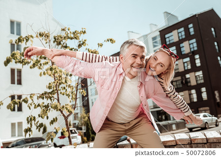 Delighted positive couple being in a great mood Delighted positive couple being in a great mood 50072806