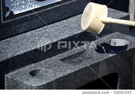 Cleaning the grave Cleaning the grave 50081955