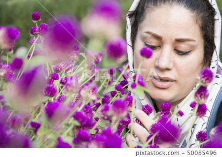 A portrait of a young beautiful muslim woman in a A portrait of a young beautiful muslim woman in a 50085496