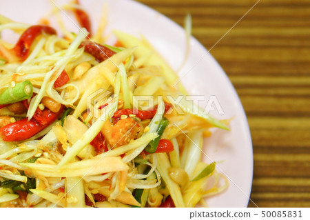 Papaya salad. Traditional spicy Thai food. 50085831