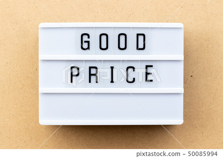 Light box with word good price on wood background 50085994