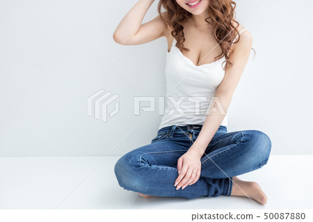 White Background Copy Space Brown Hair Curly Hair White Tank Top Denim Style Beautiful Woman 50087880