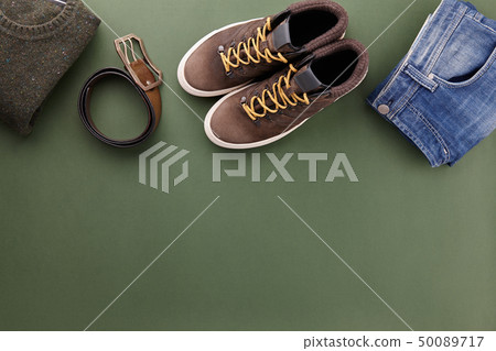 Mens fall casual clothes flat lay on green Mens fall casual clothes flat lay on green 50089717