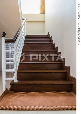 Staircase custom built home interior with wood  50089953