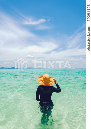 Sea travel Women are riding a boat to the island Sea travel Women are riding a boat to the island 50091198