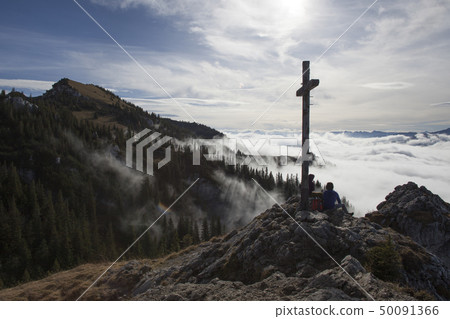 Hiker on top to summit Taubenstein mountain Hiker on top to summit Taubenstein mountain 50091366