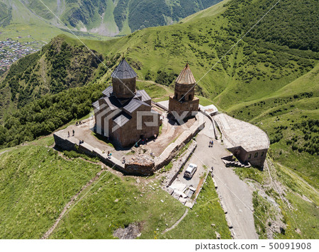 Aerial view to Gergeti Trinity Church or Tsminda Aerial view to Gergeti Trinity Church or Tsminda 50091908