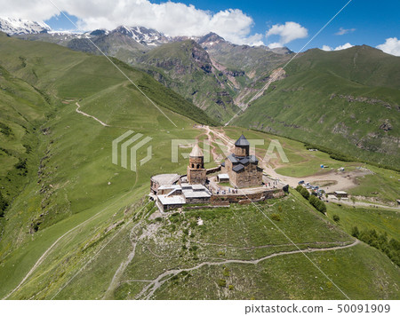 Aerial view to Gergeti Trinity Church or Tsminda Aerial view to Gergeti Trinity Church or Tsminda 50091909
