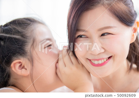Daughter whisper to mom 50092609