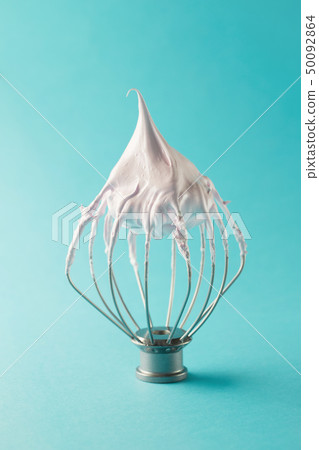 Whipped egg whites on mixer whisk Whipped egg whites on mixer whisk 50092864