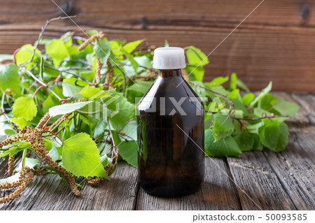 A bottle of birch tincture with young birch 50093585