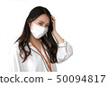 Woman in mask 50094817