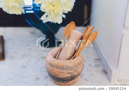 Wooden rustic and vintage crockery, tableware, utensils and stuff on wooden table-top. Kitchen still Wooden rustic and vintage crockery, tableware, utensils and stuff on wooden table-top. Kitchen still 50095154