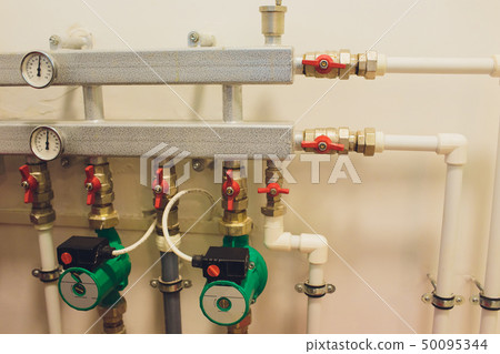 Hot water boiler. Boiler room with a heating system. 50095344