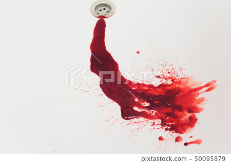 Blood draining from white bathroom basin. Bloody stains in the waterbasin hole. Sink run with blood 50095879