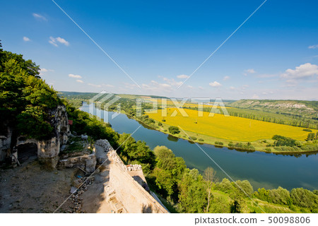 Beautiful view of nature. Blue sky, yelow field. Beautiful view of nature. Blue sky, yelow field. 50098806