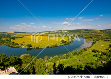 Beautiful view of nature. Blue sky, yelow field. Beautiful view of nature. Blue sky, yelow field. 50098807