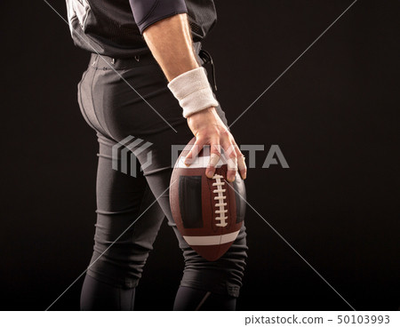 Cropped Image Of Sportsman Holding American Football Ball 50103993