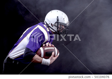 American Footballer running fast American Footballer running fast 50104076