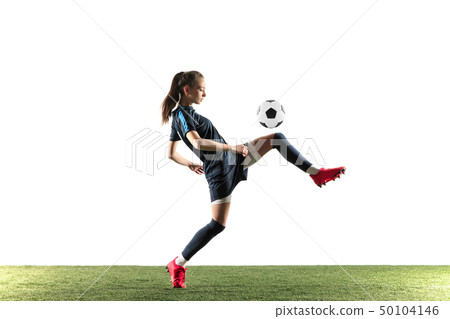 Female soccer player kicking ball isolated over white background Female soccer player kicking ball isolated over white background 50104146