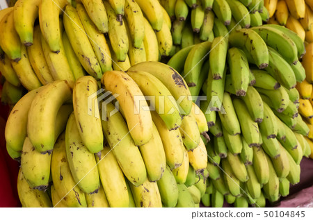 banana fruit stacked on the marketplace 50104845