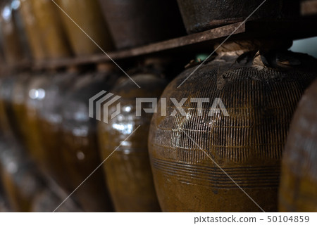 rows of fermented alcoholic beverage rows of fermented alcoholic beverage 50104859