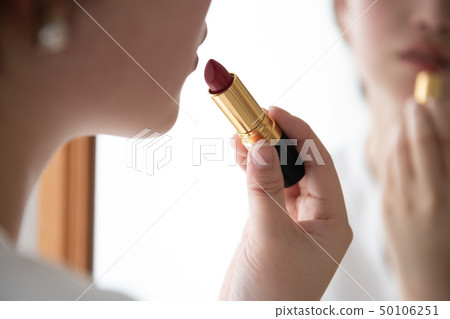 Young Japanese Woman Makeup Beauty Applying Lipstick Young Japanese Woman Makeup Beauty Applying Lipstick 50106251
