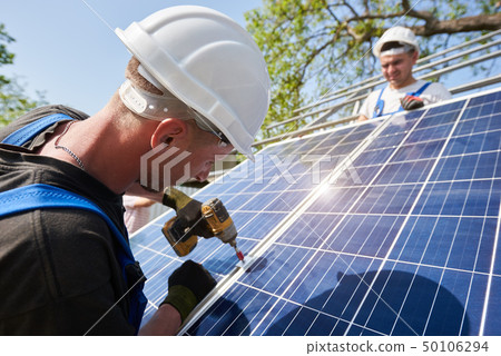 Stand-alone exterior solar panel system installation, renewable green energy generation concept. 50106294