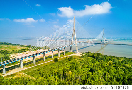 The Pont de Normandie, a road bridge across the Seine linking Le Havre to Honfleur in Normandy The Pont de Normandie, a road bridge across the Seine linking Le Havre to Honfleur in Normandy 50107376