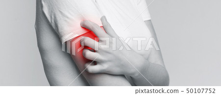Woman scratching her shoulder with red rash Woman scratching her shoulder with red rash 50107752