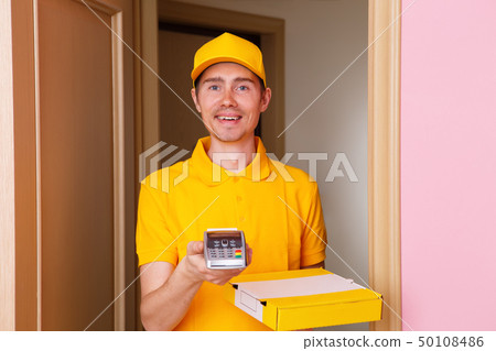 Courier man with pin pad and pizza box in hands . Courier man with pin pad and pizza box in hands . 50108486