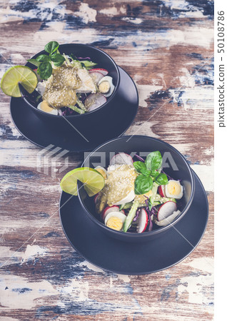 Fresh vegetable salad. Salad with radish Fresh vegetable salad. Salad with radish 50108786