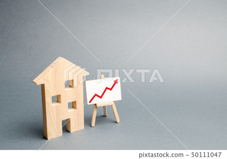Wooden house and stand with red arrow up. Growing 50111047