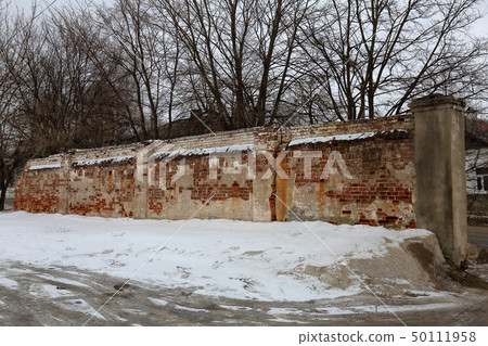 Destroyed brick wall Destroyed brick wall 50111958