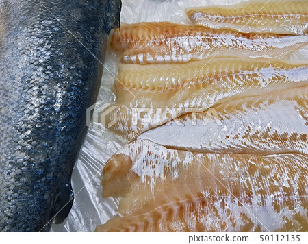 Appetizing raw fish steaks 50112135