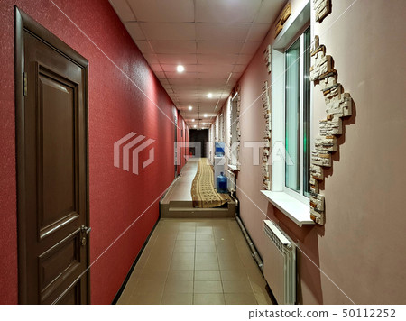 Narrow corridor in the hotel 50112252