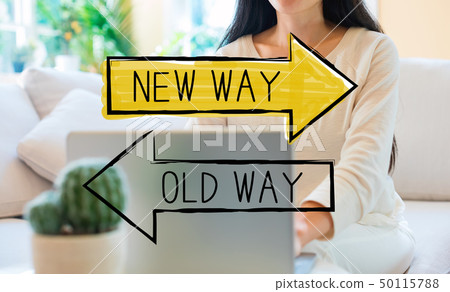 Old way or new way with woman using her laptop 50115788