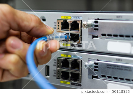Hand of man holding The network cables 50118535