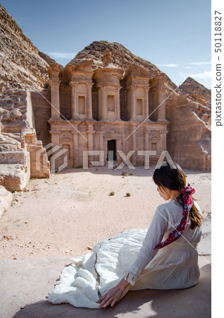 Asian woman tourist sitting in Petra, Jordan Asian woman tourist sitting in Petra, Jordan 50118827