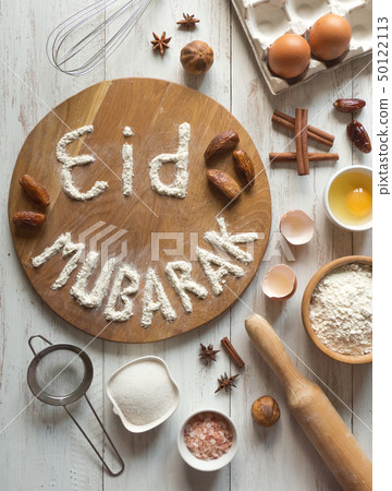 Eid Mubarak Arabic cuisine background. Eid Mubarak Arabic cuisine background. 50122113