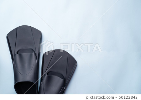 Flippers on blue background. Flippers on blue background. 50122842