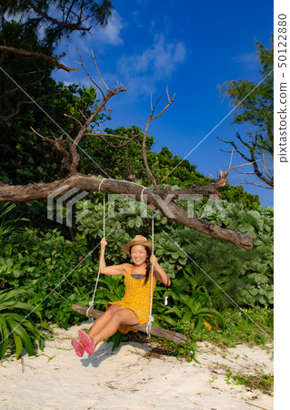 Girl on a swing Girl on a swing 50122880