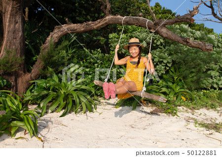 Girl on a swing Girl on a swing 50122881