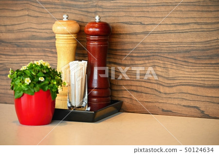Beautiful wooden table in restaurant or home. Beautiful wooden table in restaurant or home. 50124634