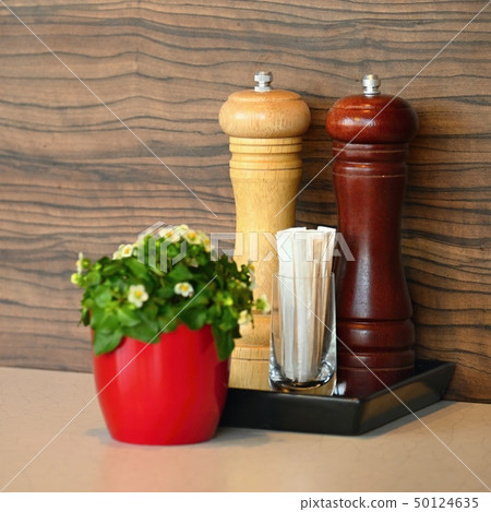 Beautiful wooden table in restaurant or home. Beautiful wooden table in restaurant or home. 50124635